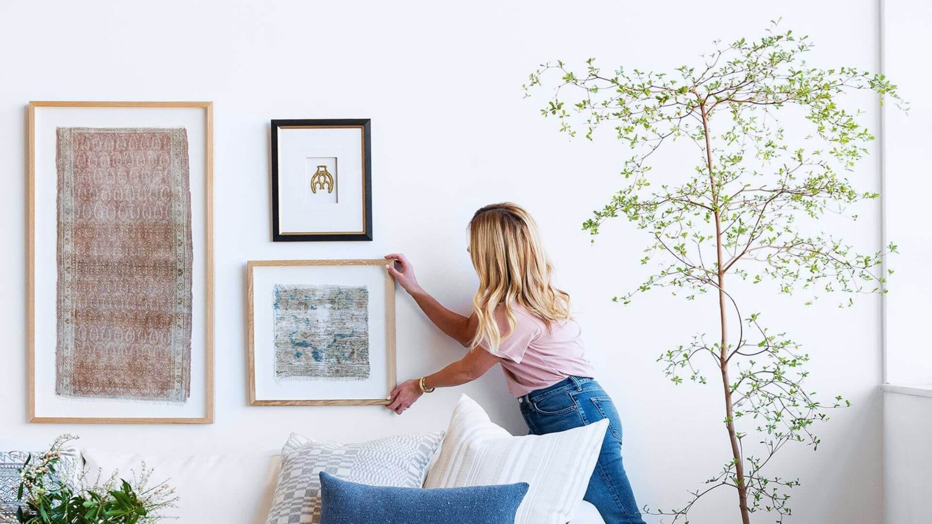hanging frame on wall with tree